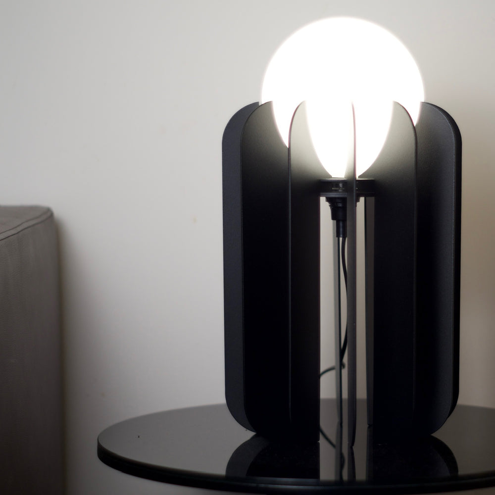 
                  
                    Lampe à poser MOA
                  
                